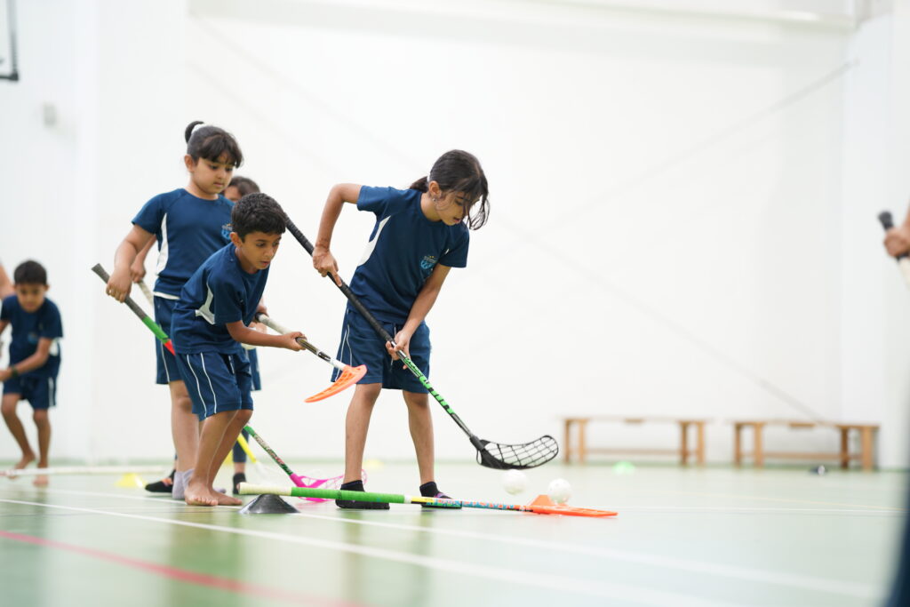 Students playing hockey
